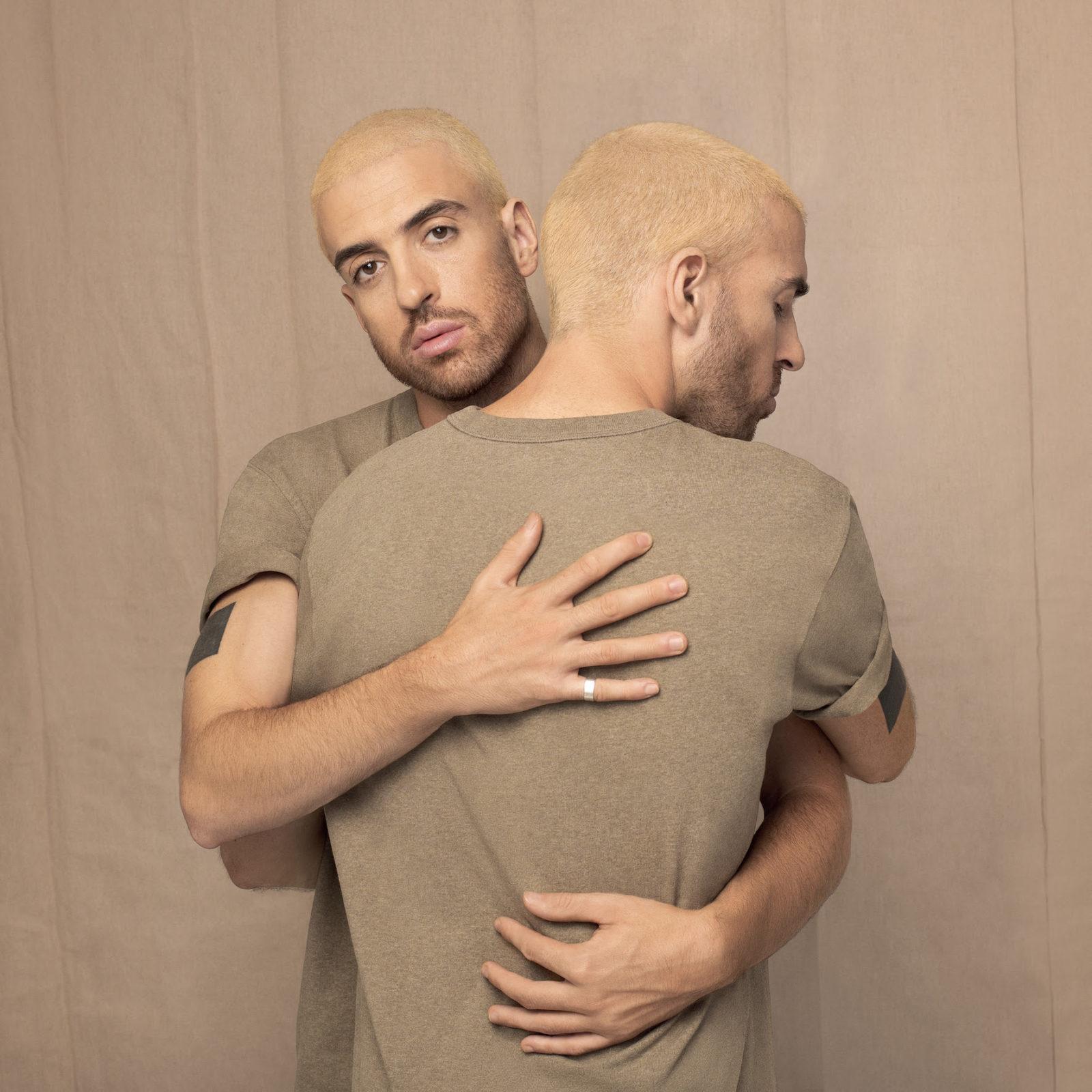 2 men hugging