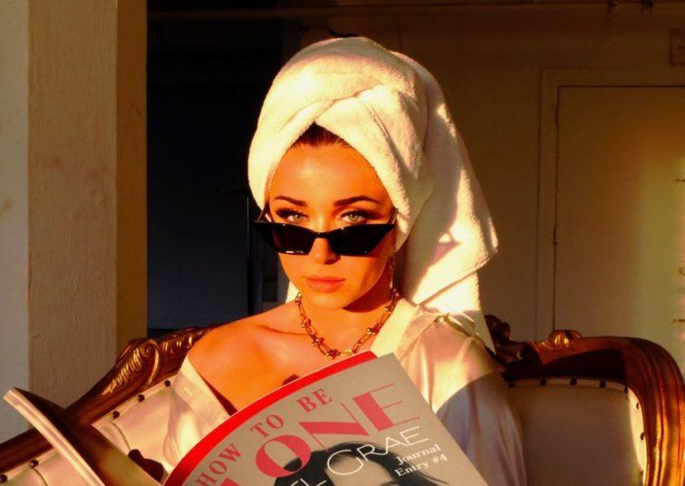 woman reading fashion magazine