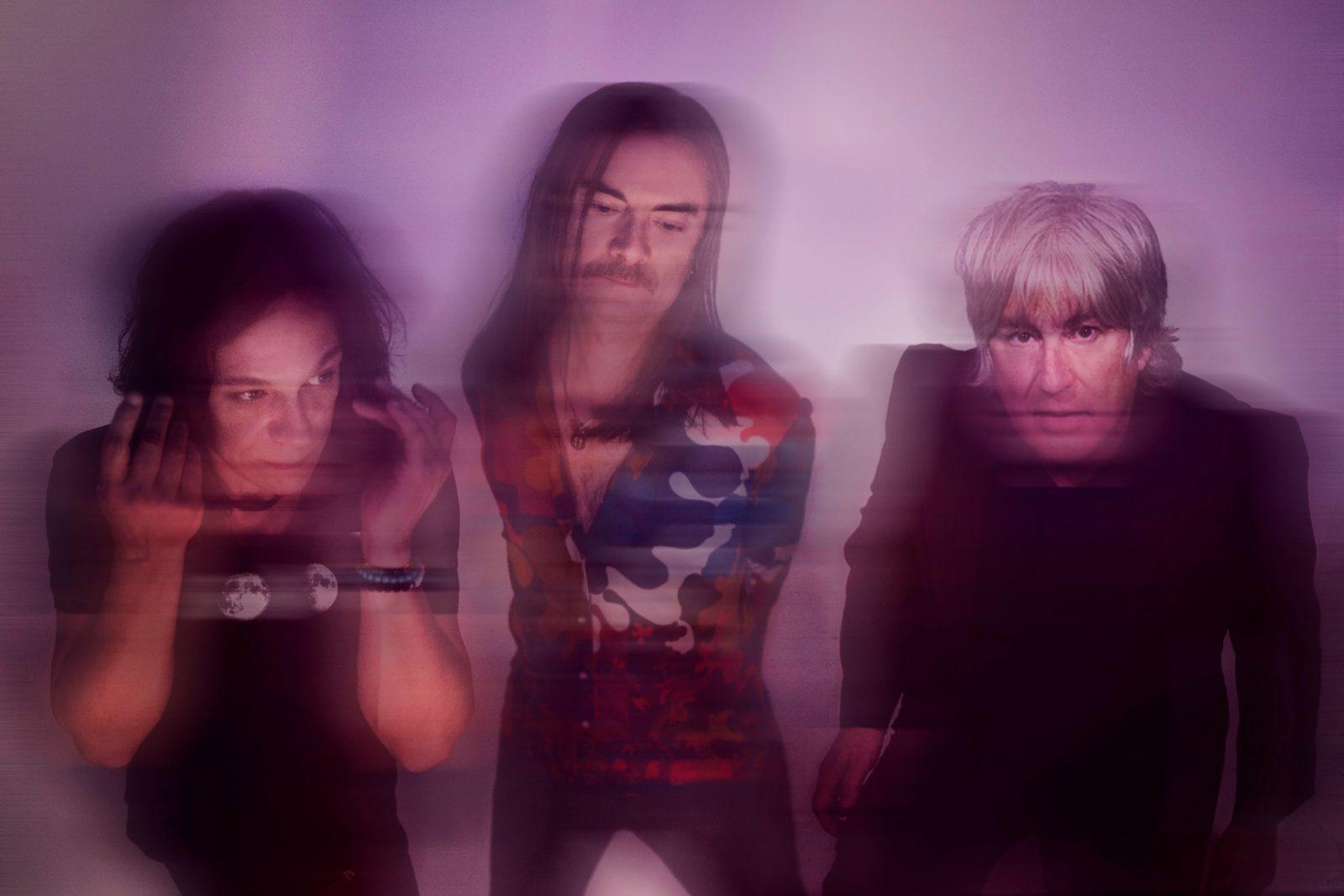 psychedelic image of 3 band members