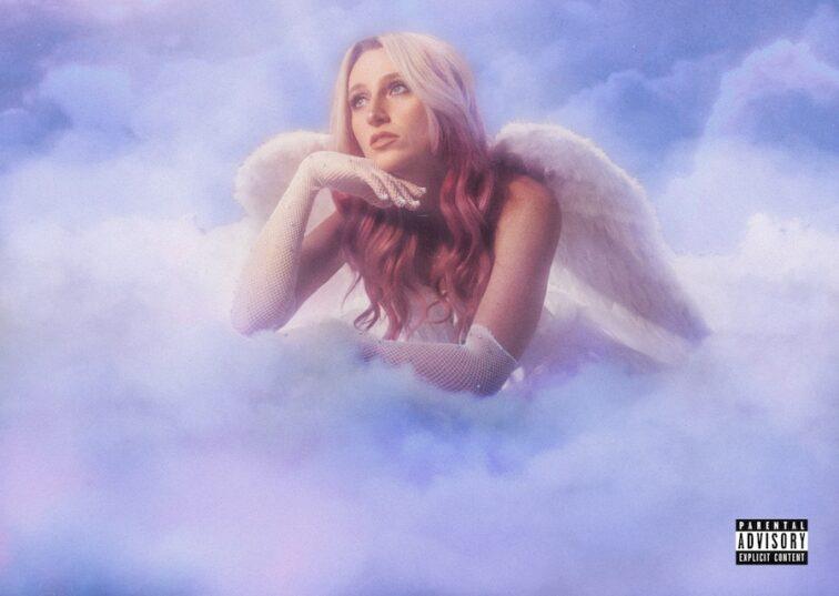 woman with angel wings laying in clouds