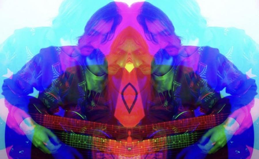 psychedelic image of a man with lots of colors