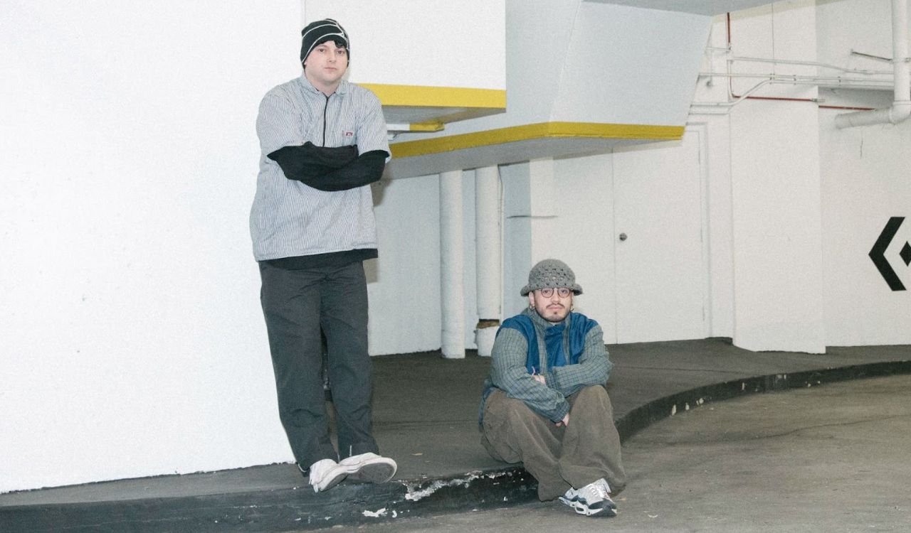 two men in a parking garage
