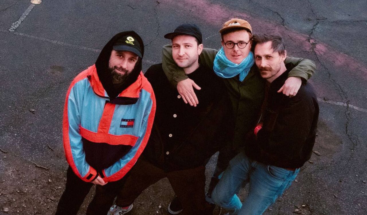 band standing on a street