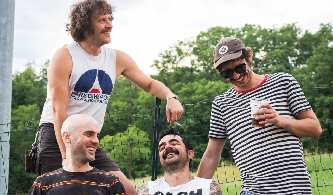 band hanging out in a backyard